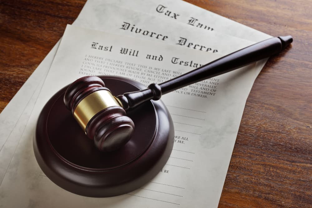 Gavel and legal papers last will and testament, divorce decree